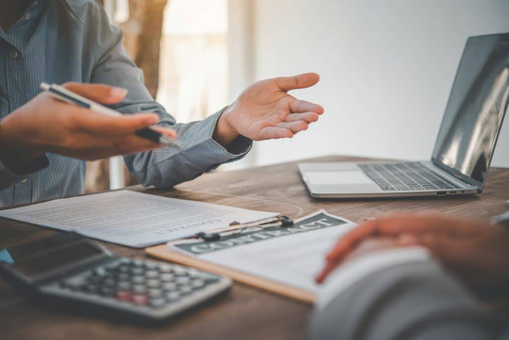 businessman is negotiating, advising, and explaining the matter of the contract